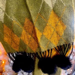 this is a cashmere scarf with tassels of rabbit fur 62 inches long 12“ wide